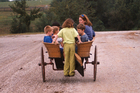 Jan Mactier  gives the next generation of riders a lift in the pony cart.